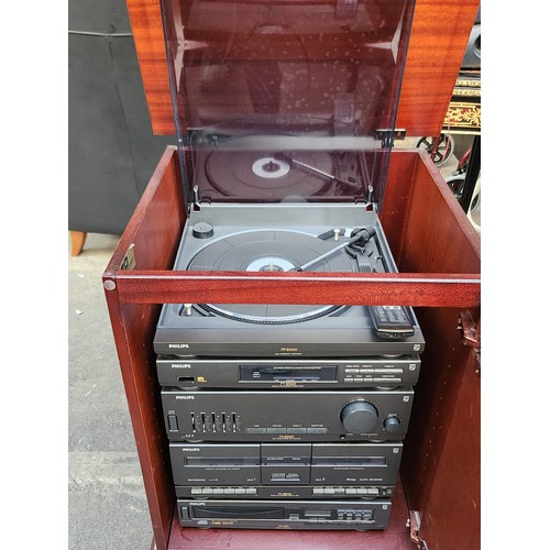 478 - Vintage mahogany cabinet with integrated Philips stereo system, featuring cassette deck, equalizer, ... 