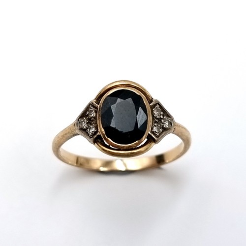 5 - Star Lot : A lovely antique oval facet black onyx ring with diamond shoulders set in 14 carat gold. ... 