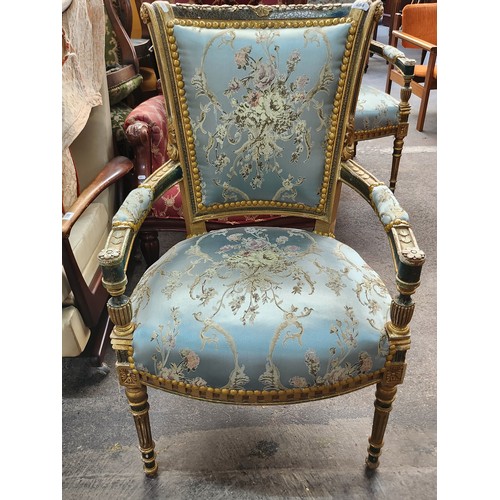 484 - Star Lot : An amazing Pair of French carved and gilded Parlour chairs with intricate floral upholste... 