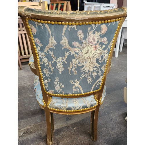 484 - Star Lot : An amazing Pair of French carved and gilded Parlour chairs with intricate floral upholste... 