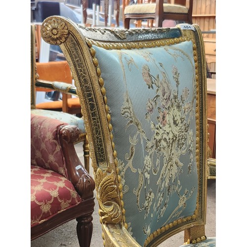 484 - Star Lot : An amazing Pair of French carved and gilded Parlour chairs with intricate floral upholste... 