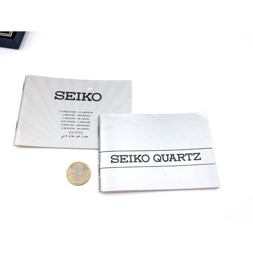 17 - A SEIKO Quartz stainless steel wrist watch. No. 900329. Housed in original SEIKO branded watch box.