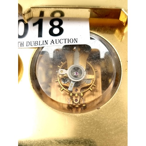 18 - A heavy Mallory Bath brass carriage clock with roman numeral dial. Comes with original key.