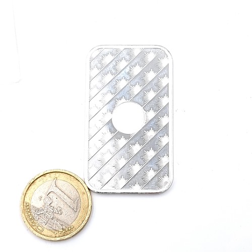 35 - A Sunshine Minting .999 fine silver 1 ounce medallion encapsulated in solid silver bar.