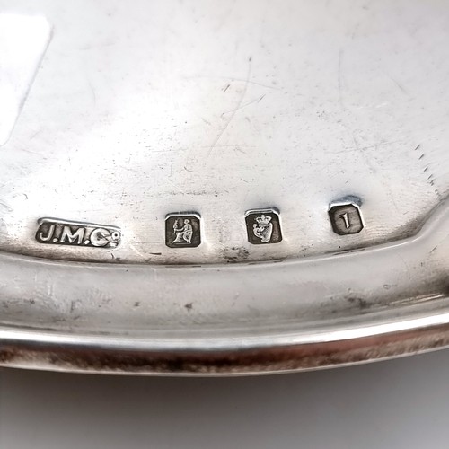 49 - Star Lot : A heavy vintage footed Irish silver circular tray set with a pie crust rim hallmarked Dub... 