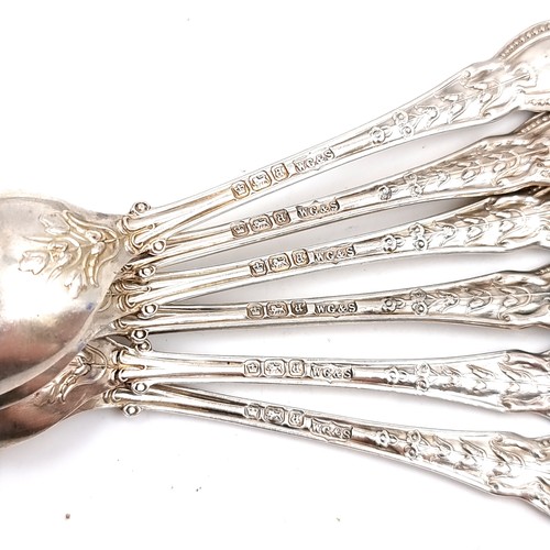 54 - A very pretty antique set of six sterling silver teaspoons with attractive design on handles. Dimens... 