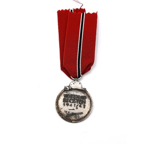 525 - An original WWII Third Reich Medaille 