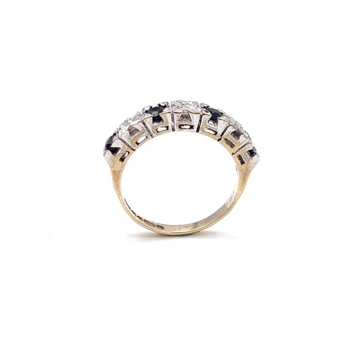 604 - Star Lot : A very attractive diamond and sapphire ring set in nine carat gold. Stamped 375. Size K. ... 