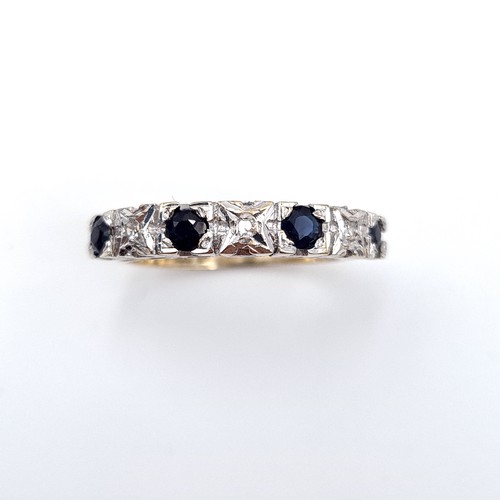 604 - Star Lot : A very attractive diamond and sapphire ring set in nine carat gold. Stamped 375. Size K. ... 