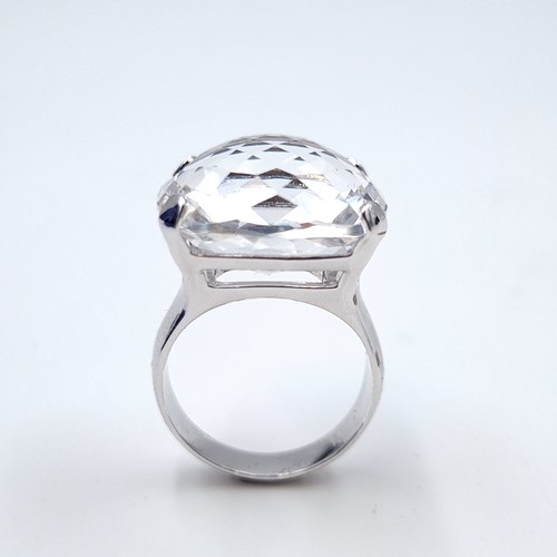 595 - A very large Swarovski crystal cocktail ring. Ring size - R. Comes in original Swarovski box with ce... 