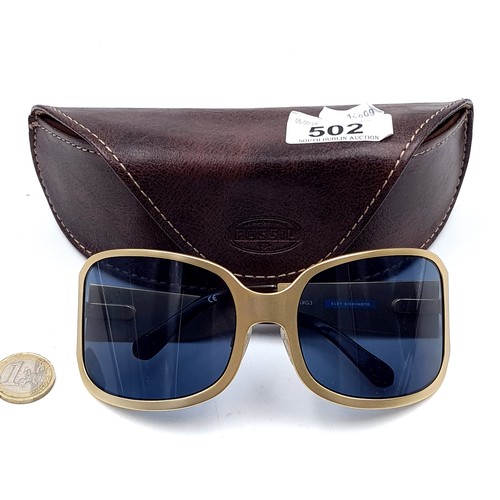 503 - A pair of gold toned Eley-Kishimoto sunglasses marked 'Eley Kishimoto' EK#G3 on frame. Lenses in goo... 