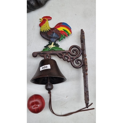 400 - Vintage cast iron rooster-themed dinner bell with colorful painted details. Features intricate mount... 