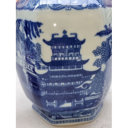 409 - Blue and white porcelain ginger jar features traditional Chinese pagoda and landscape motifs, hexago... 