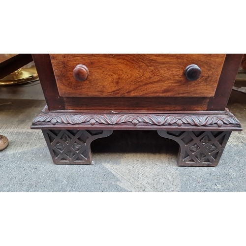 413 - Super star Lot : A stunning Victorian mahogany pedestal desk features intricate carved details, nine... 