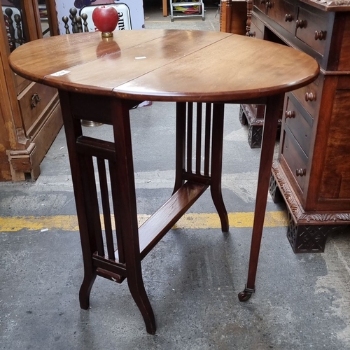 415 - Star lot : A stunning, antique Narrow Oak drop-leaf table, featuring slatted sides and a lower stret... 