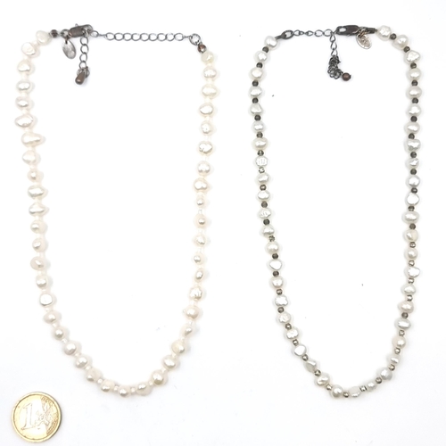 11 - Two fresh water pearl necklaces. Lengths - 40 cms. Total weight - 38 grams.