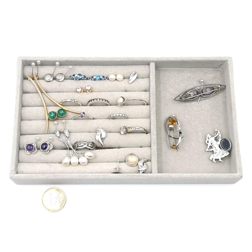 2 - A large collection of sterling silver rings together with earrings and brooches. Some with gem set f... 