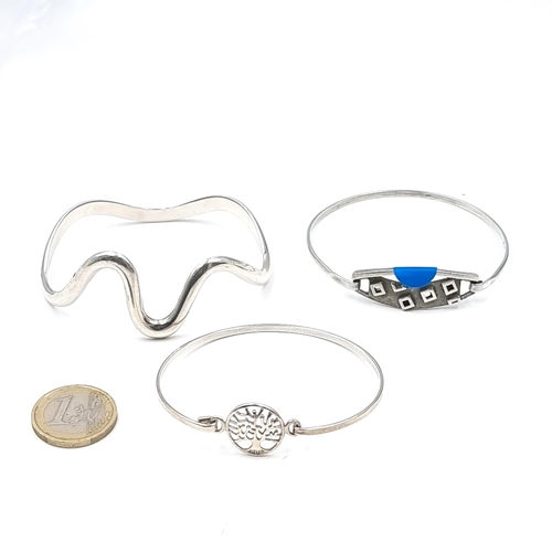 3 - Three pretty sterling silver bangles. Weight of all items - 41.39 grams.