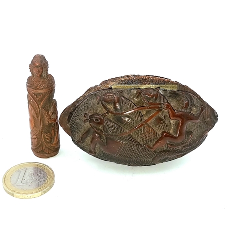 32 - Two 18th century coquilla nut items consisting of a snuff box carved with a man riding seahorses tog... 