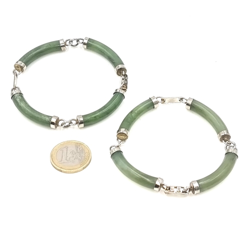 35 - Two attractive Jade bracelets with chain link spaces. Weight - 38.1 grams.