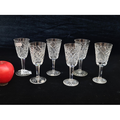 145 - A striking set of six Waterford Crystal stemmed drinking glasses. All in excellent condition, retain... 