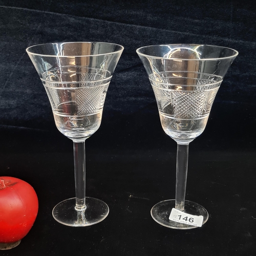 146 - A beautiful pair of Newbridge Living tall stemmed wine glasses both in excellent condition.