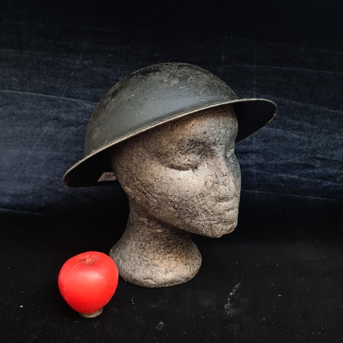 157 - An interesting early War home front steel helmet.