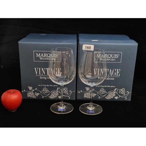 160 - Two boxes of four Marquis by Waterford Crystal deep wine glasses.