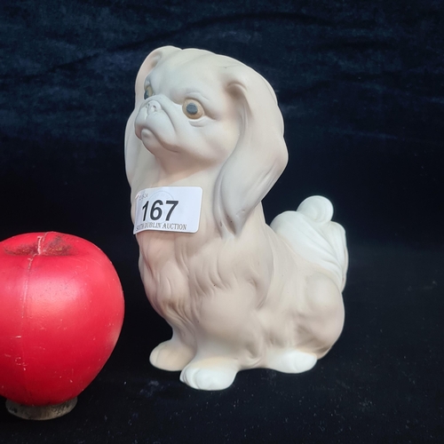 167 - A wonderful LLadro porcelain figure of a Pekingese dog.