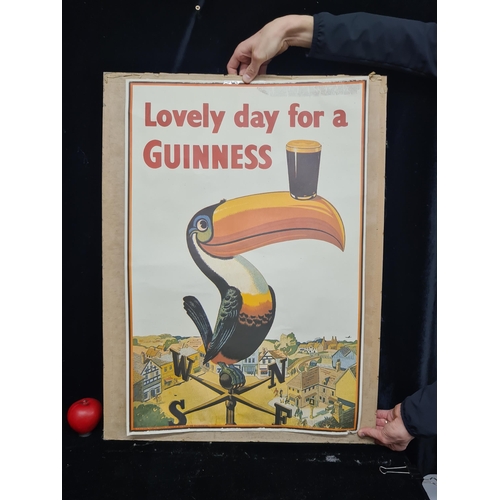 175 - A fantastic vintage original Guinness advertising poster depicting the iconic toucan. Sticky tape al... 