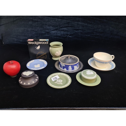 176 - Seven pieces of Wedgwood pottery including a teacup, saucer and ring dish.