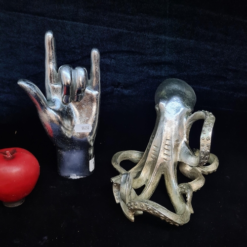 178 - Two unusual abstract decorative  items including a figure of an octopus and a hand. Brand new from a... 