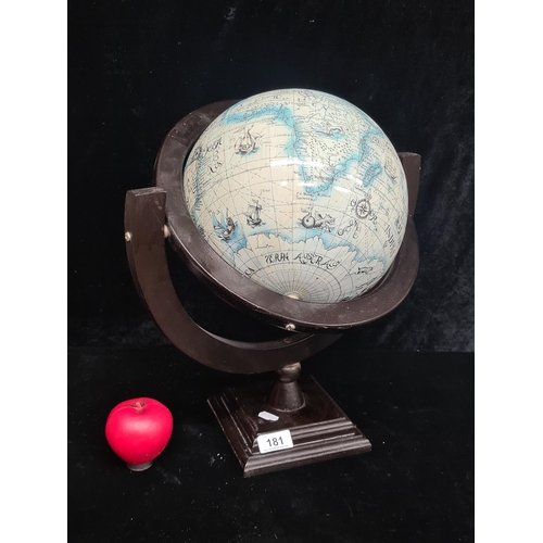 181 - A fantastic vintage globe held on a spinning wooden axis.