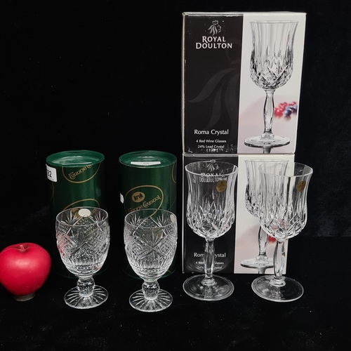 182 - A beautiful pair of Tyrone Crystal drinking glasses featuring an intricately cut pattern and knotted... 