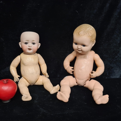 195 - Two antique porcelain sleepy eyed baby dolls including one with stamp Heubach-Coppelsdorf Germany 26... 