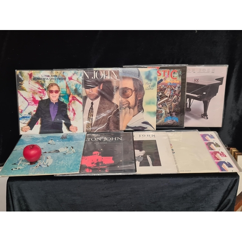 197 - A collection of ten Elton John vinyl records including Leather Jackets, Wonderful Crazy Night, Break... 