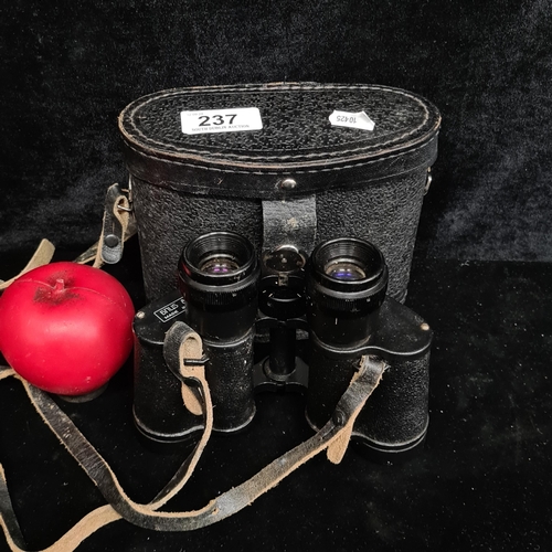 237 - A pair of vintage Russian БПU5 8x30 binoculars and case. Original leather straps and red lining.