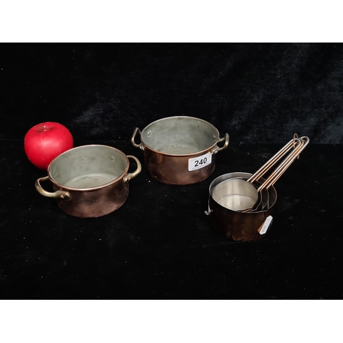 240 - A set of six  copper and brass vintage kitchen measures.