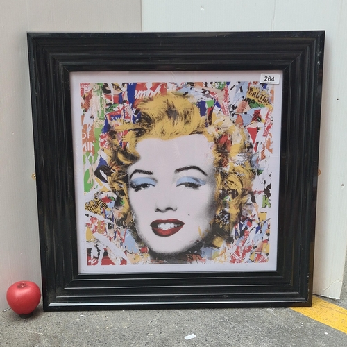 264 - A quality print on paper by Mr Brainwash  featuring Marilyn Monroe. Housed in a smart black frame be... 