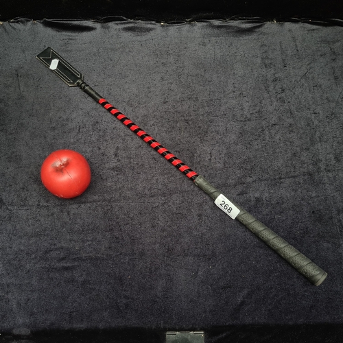 268 - A black and red braided Riding crop / whip.