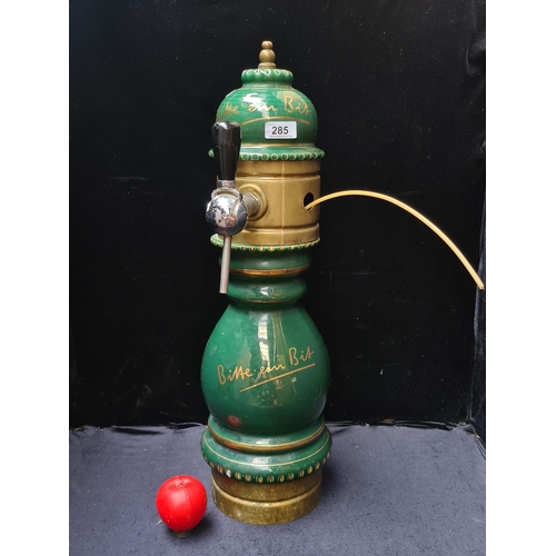 285 - A fabulous large ceramic and brass German beer pump. Heavy piece.