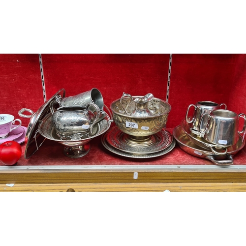 297 - A selection of twelve silver plated EPNS tableware. Includes serving trays, tea pots and milk jugs.