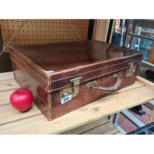 308 - A fantastic vintage brown leather hard shell suit case. Nice grain to this one.