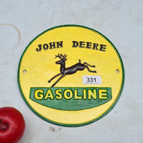 331 - A John Deere 'Gasoline' heavy cast iron sign. Features pastel yellow and green tones.