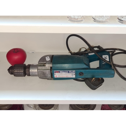 348 - A Makita 240w 19mm Hammer drill.