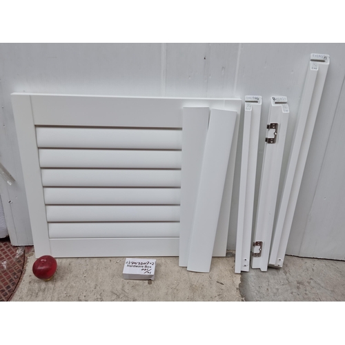 361 - An as new, clean white wood window shutter, never been used. Comes in original packaging.