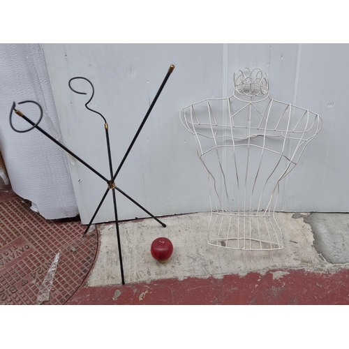 363 - A large white wire female bust with a black metal umbrella stand.