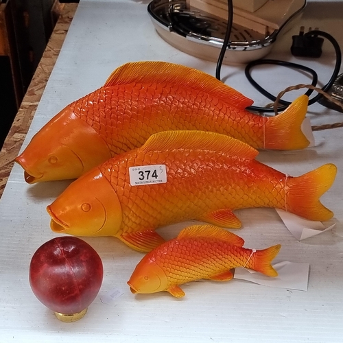 374 - A pair of vibrant orange Koi fish figures with wall mount features to bases. brand new from a top UK... 