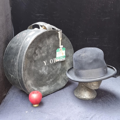 387 - A fantastic Lincoln Bennett black felt bowler hat with satin lining. Retailed  by Switzers Dublin. C... 