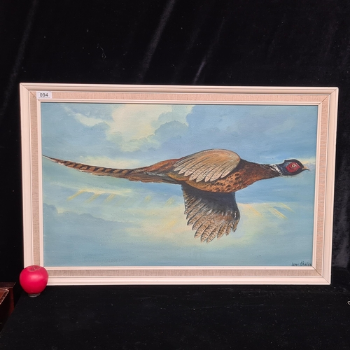 94 - A large mid century oil on board painting featuring a Pheasant in full flight. Signed 'Denis O'Brien... 